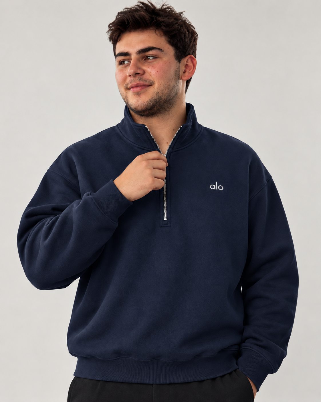 Sudadera ALO Accolade 1/4 Zip azul marino, detalle del cierre de cuarto