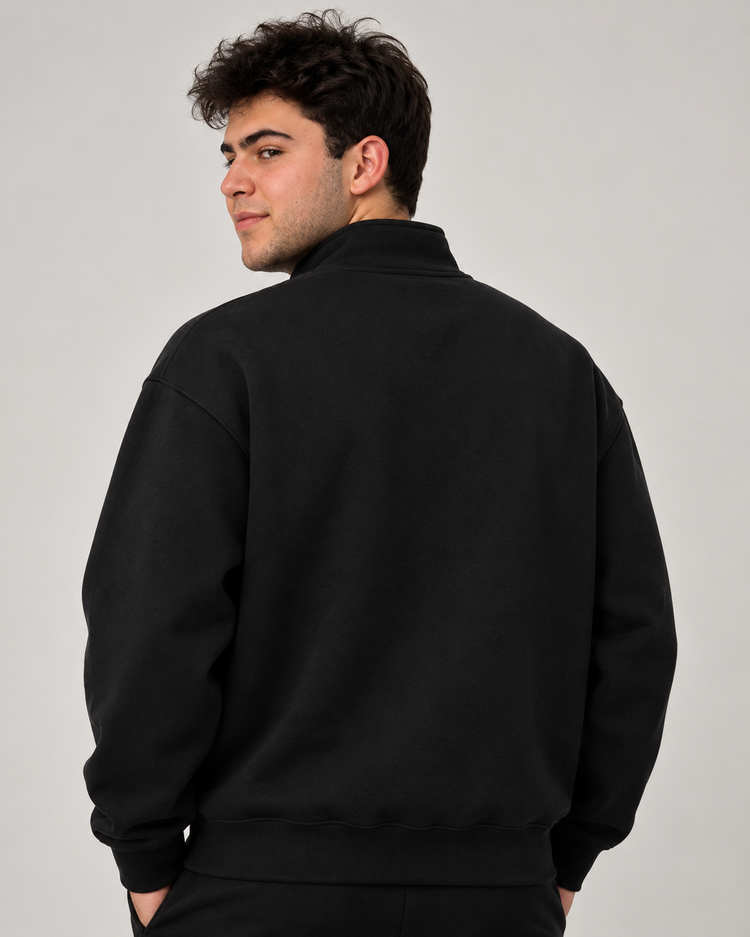 Sudadera ALO Accolade 1/4 Zip negra, vista de espalda
